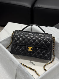 Chanel – Top Handle Flap Bag (Black Lambskin Leather)
