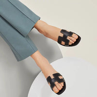 Hermes Black Oran Sandals With White Stiches