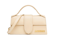 The Bambino Small handbag with adjustable crossbody strap.