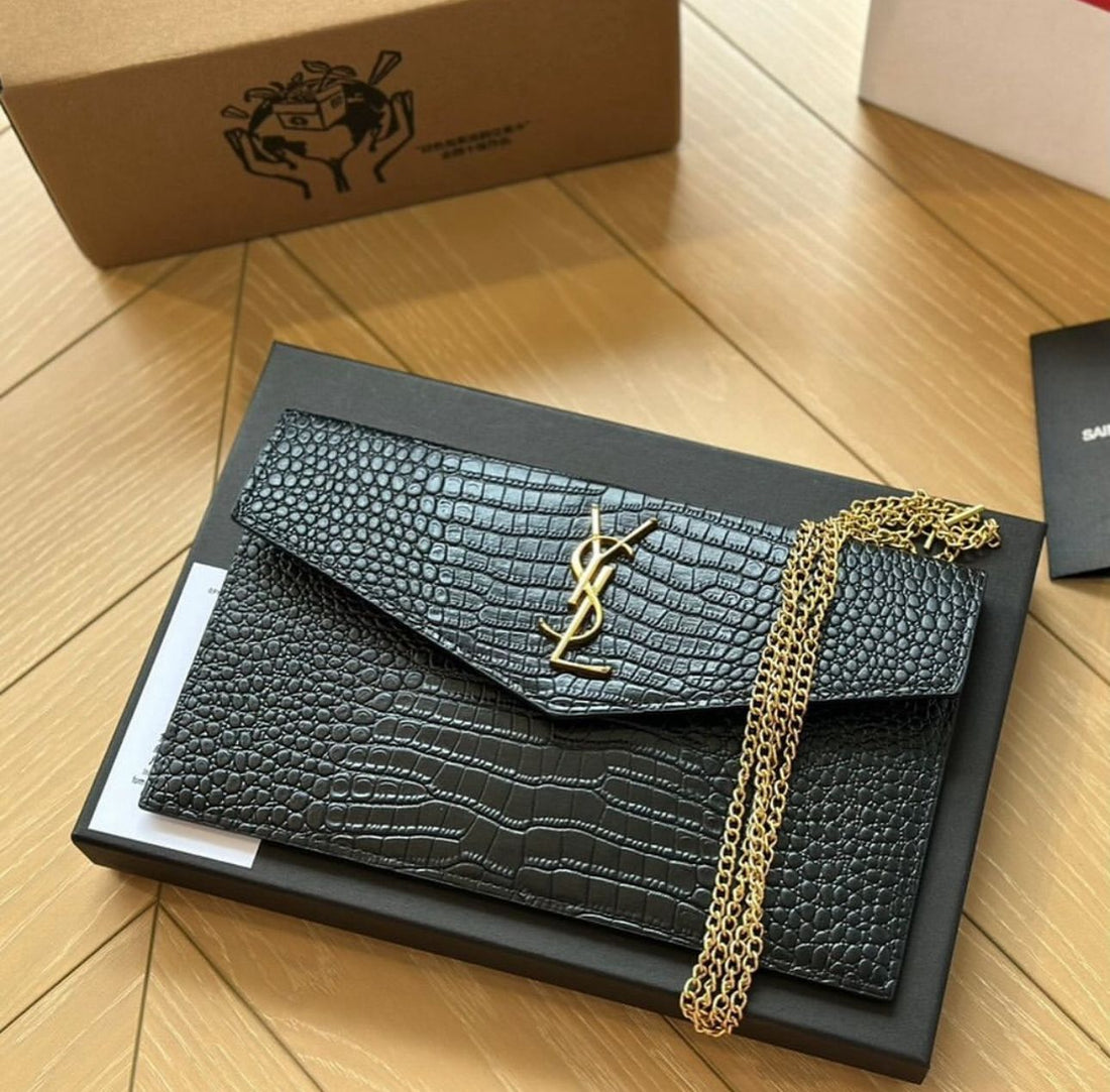 YSL uptown pouch in crocodile-embossed shiny leather