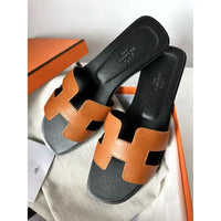 Hermès Oran Leather Sandal in Brown with Black Sole