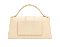 The Bambino Small handbag with adjustable crossbody strap.