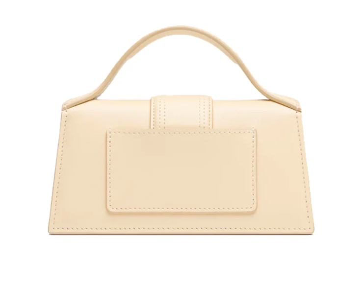 The Bambino Small handbag with adjustable crossbody strap.