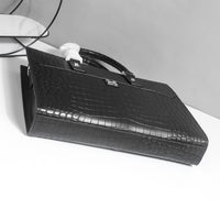 Hermès black crocodile leather briefcase