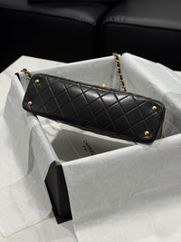 Chanel – Top Handle Flap Bag (Black Lambskin Leather)