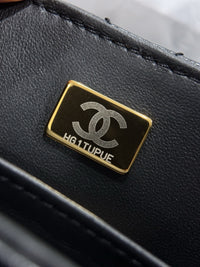 Chanel – Top Handle Flap Bag (Black Lambskin Leather)