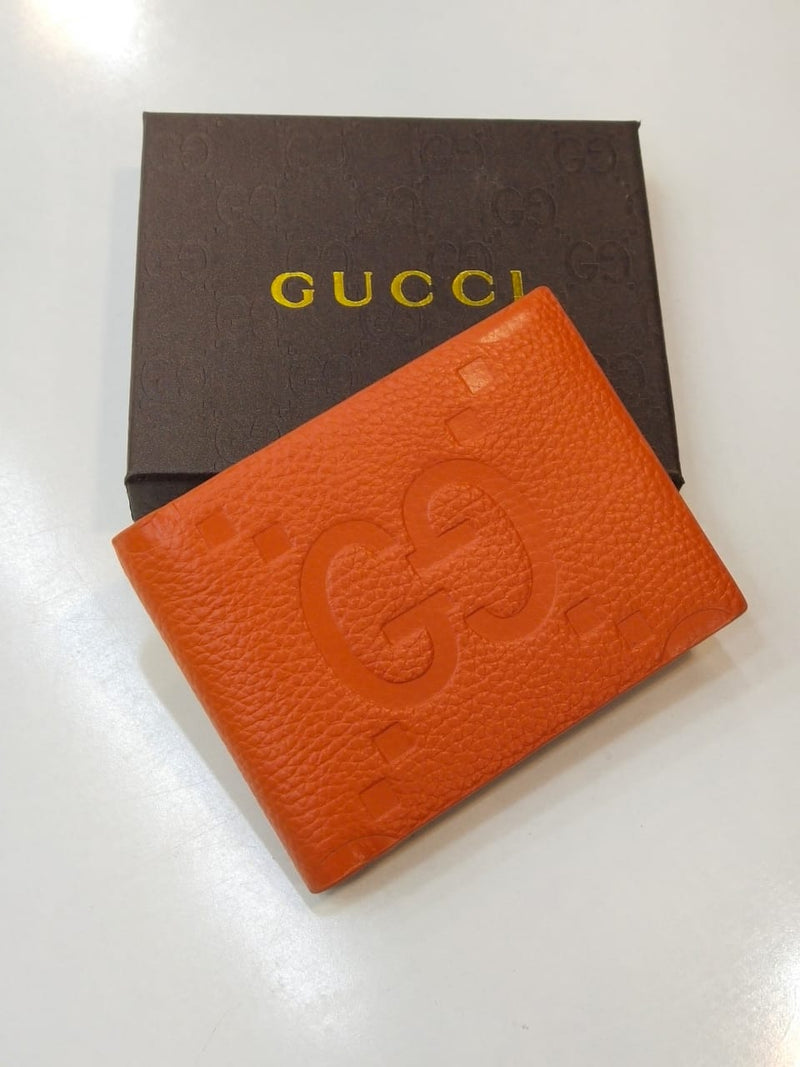 Gucci – Embossed GG Logo Wallet