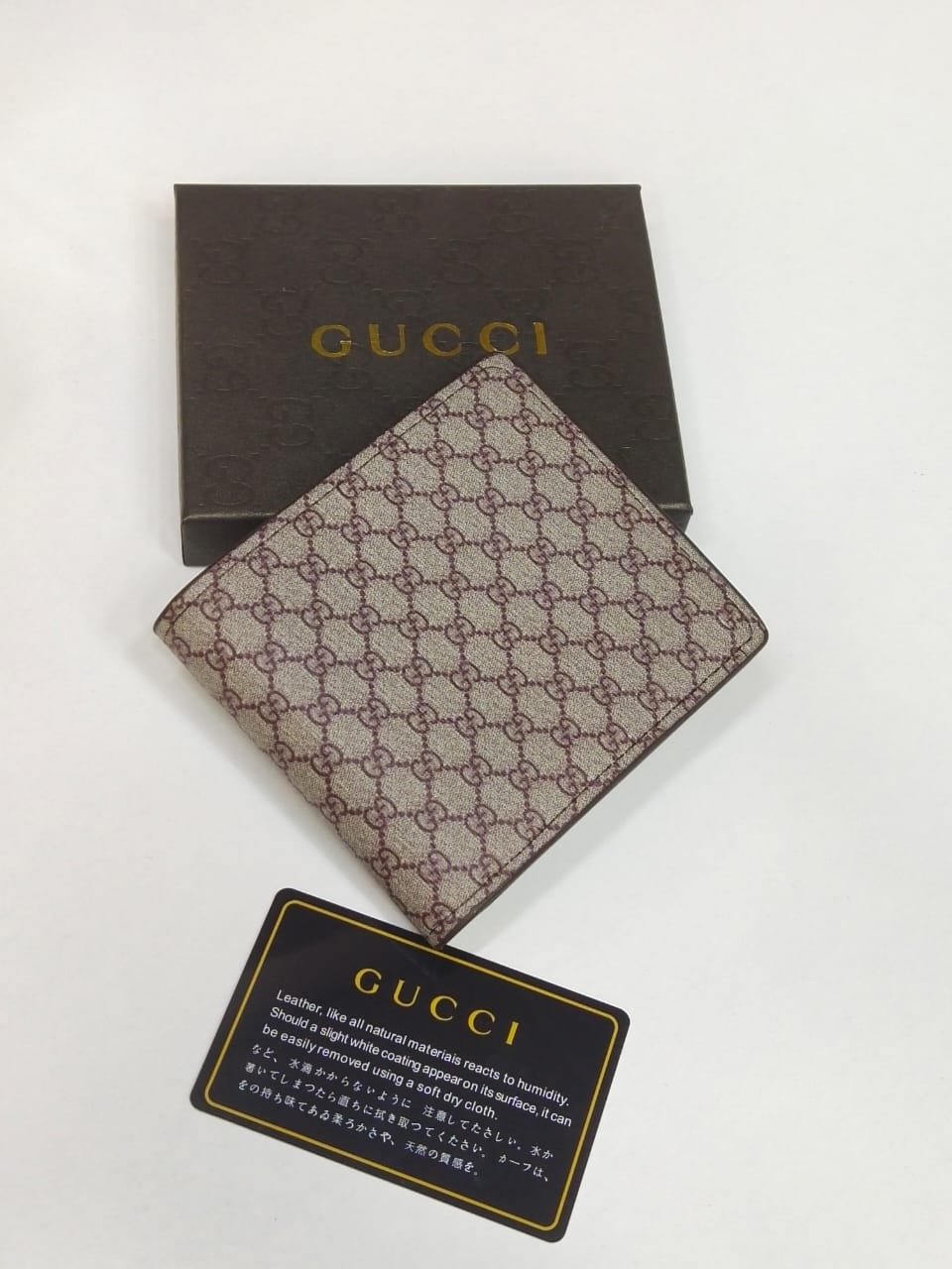 Gucci – GG Supreme Bi-Fold Wallet