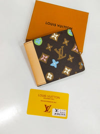 Louis Vuitton – Chocolate Craggy Monogram Bi-Fold Wallet