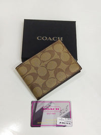 Coach – Compact ID Wallet (Signature Canvas)