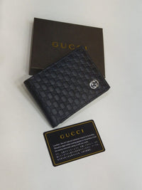 Gucci – Microguccissima Leather Bi-Fold Wallet (Black)