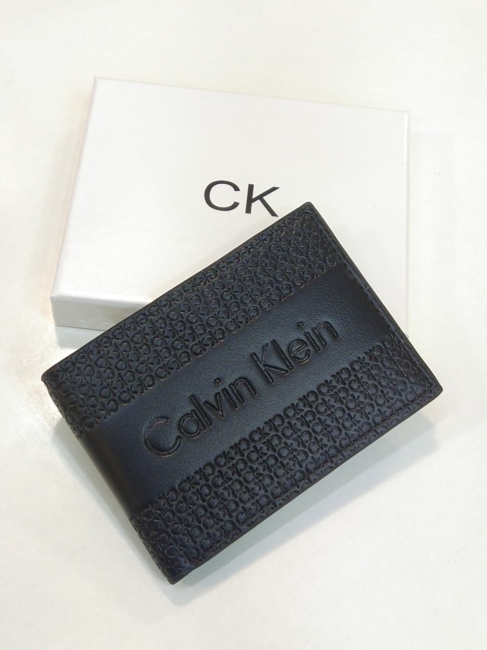 Calvin Klein – Embossed Logo Bi-Fold Wallet