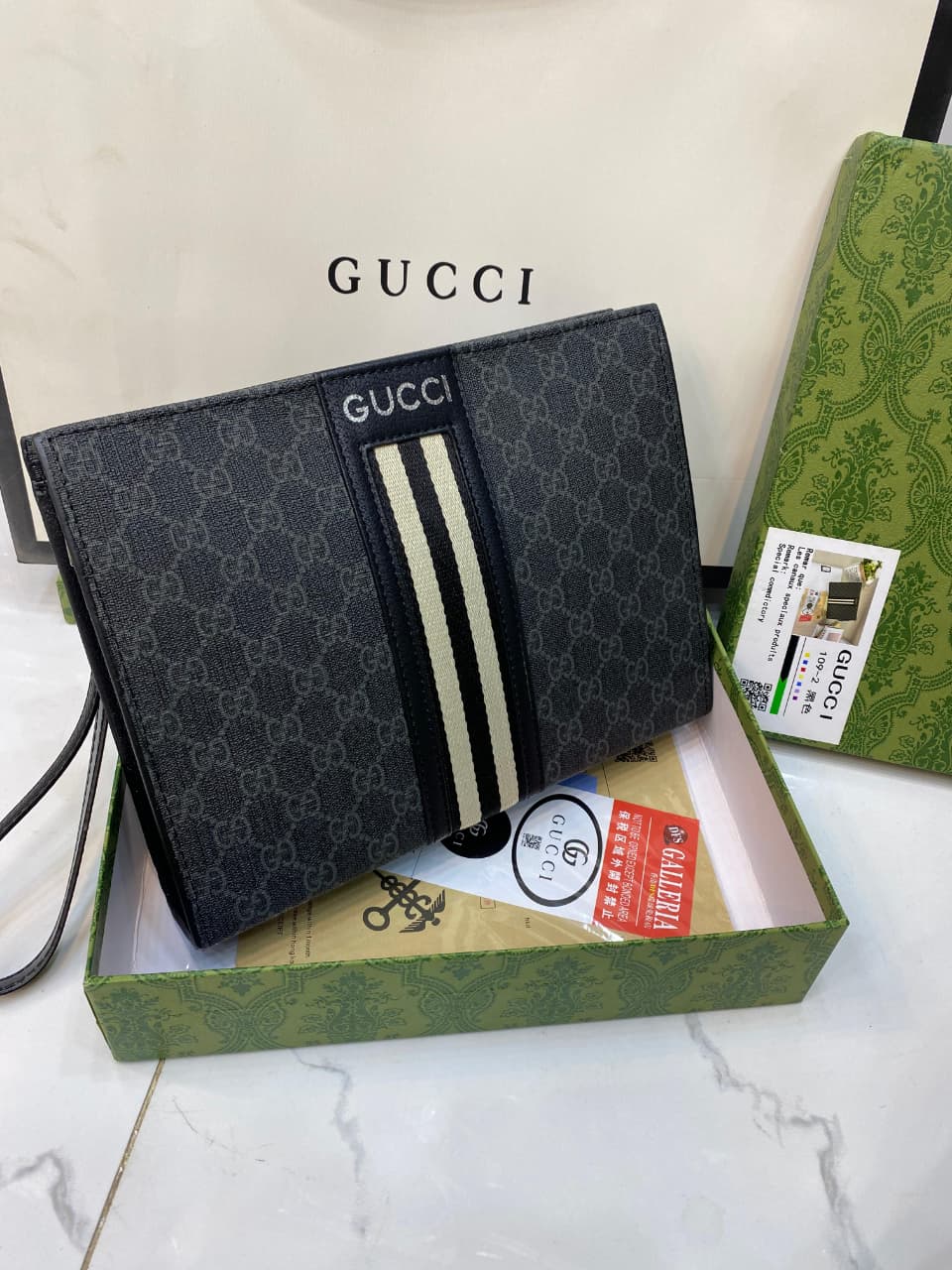 GUCCI SIGNATURE POCHETTE CLUTCH FOR MEN