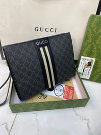 GUCCI SIGNATURE POCHETTE CLUTCH FOR MEN