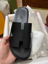 HERMÈS IZMIR BLACK SLIDE MEN