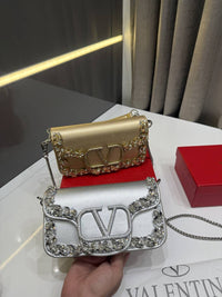 Valentino Garavani small Locò cross body bag