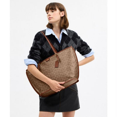 COACH  Taxi Tote Bag In Signature Canvas hover