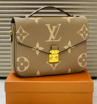 Louis Vuitton  Giant Monogram Empreinte Pochette Métis