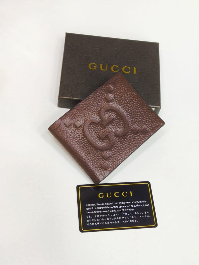 Gucci – Embossed GG Logo Wallet